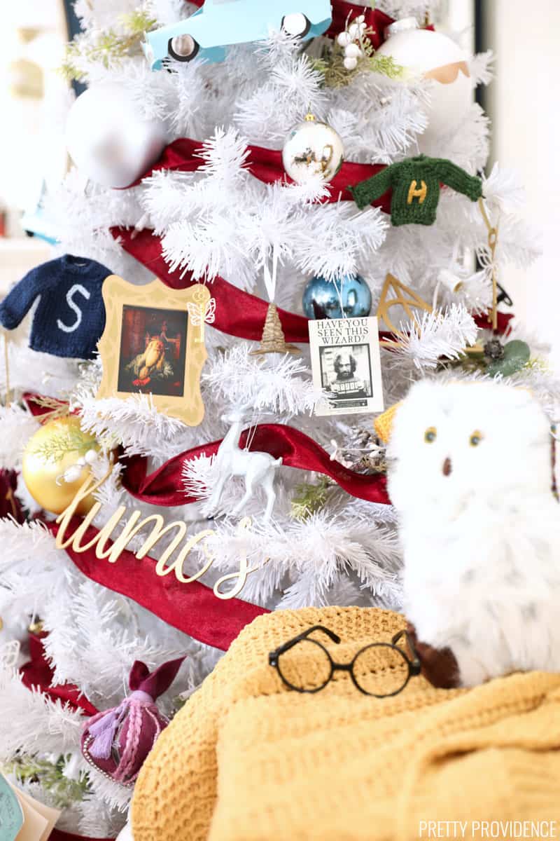 Harry Potter Christmas Tree with plush Hedwig and Harry's glasses next to it