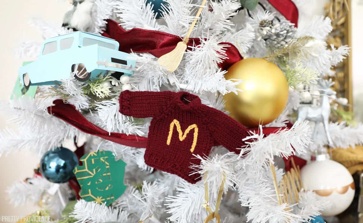 Mini red sweater with yellow 'M' on the front Harry Potter Christmas ornament