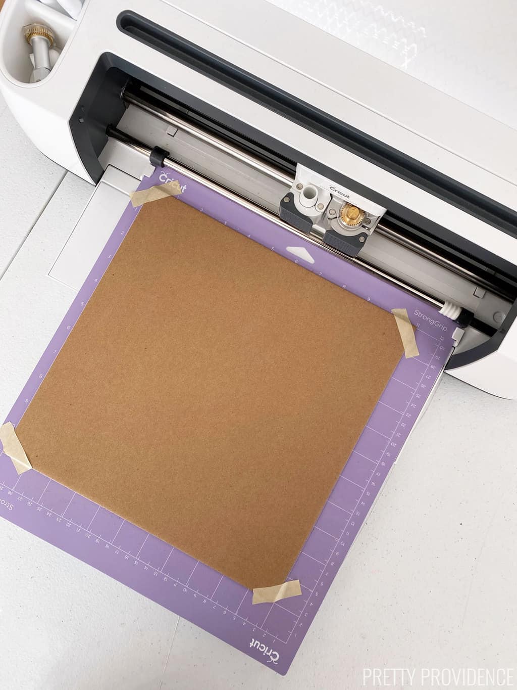Cricut Chipboard cutting on purple mat 