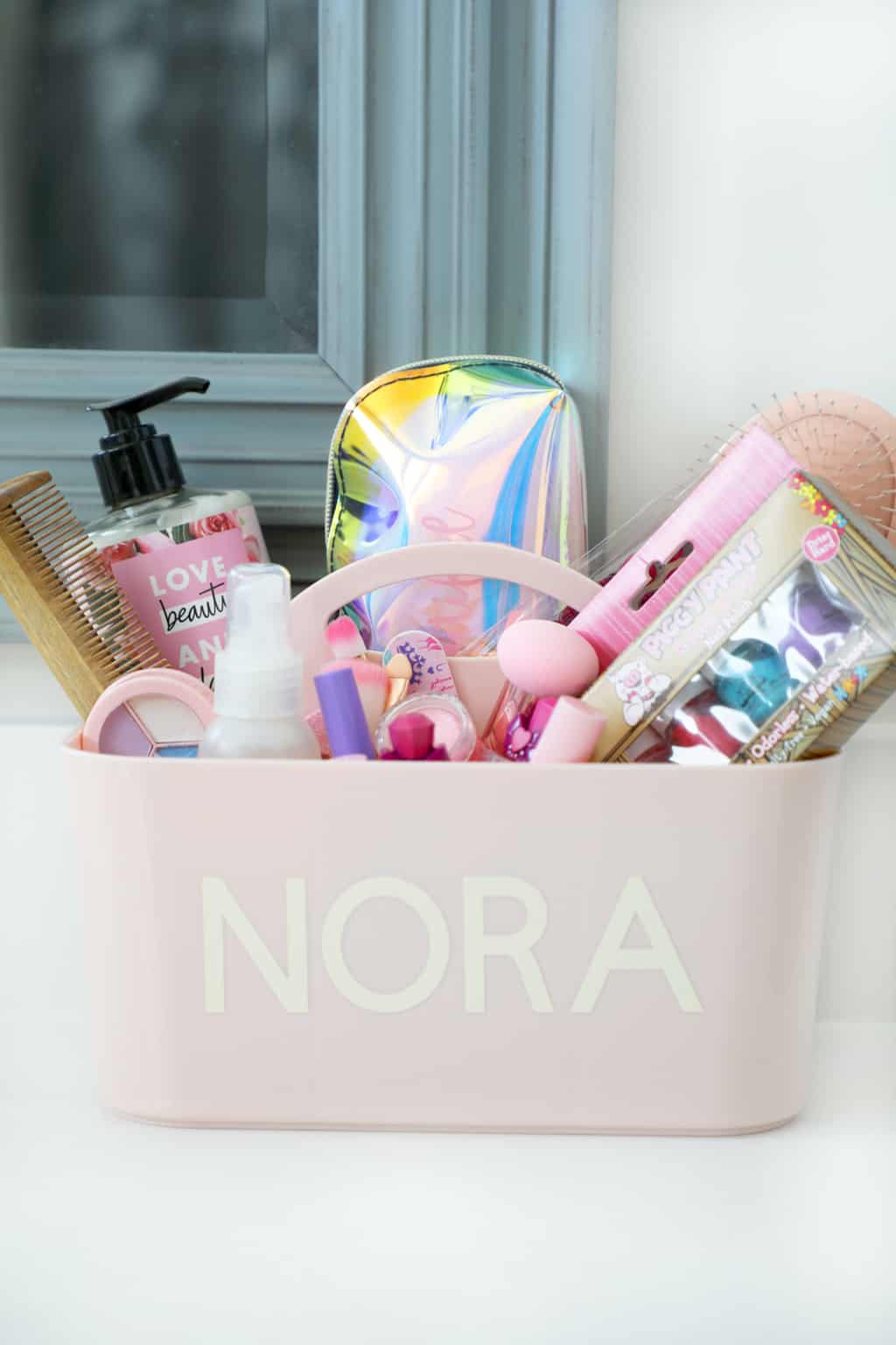 personalized pink make up caddy on bathroom counter