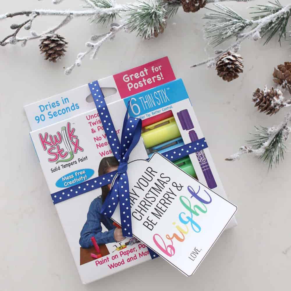 Markers with a gift tag that says 'May your Christmas be Merry and Bright."