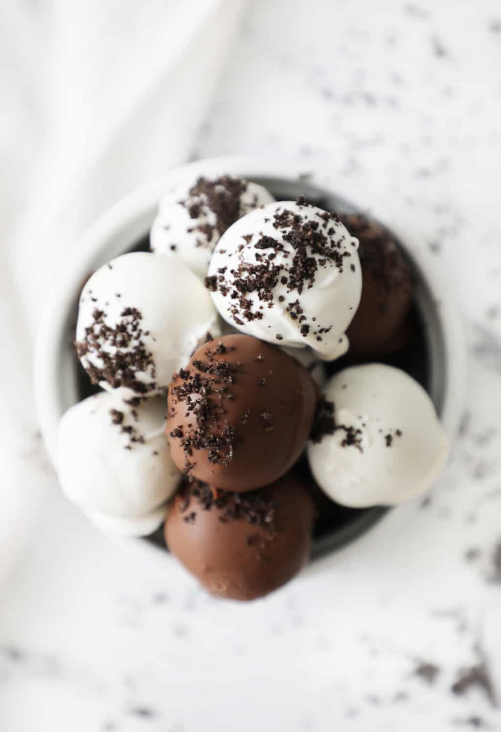 birds eye view of Oreo truffles in a small white bowl