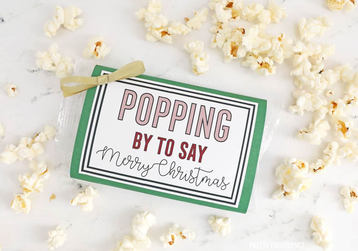 Popcorn package with Christmas tag on the front 'Popping by to say Merry Christmas'