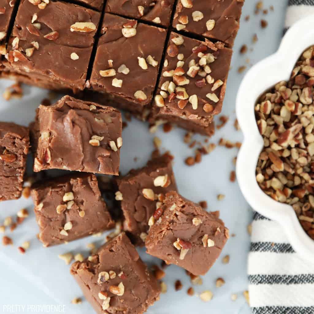 Fantasy fudge cut into squares with nuts on top
