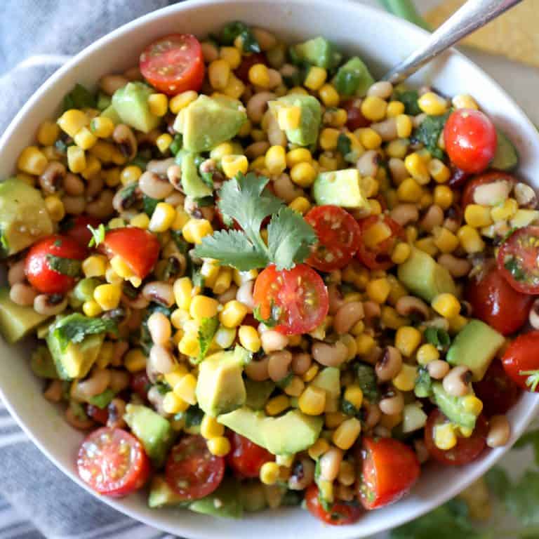 close up of a bowl of corn salsa