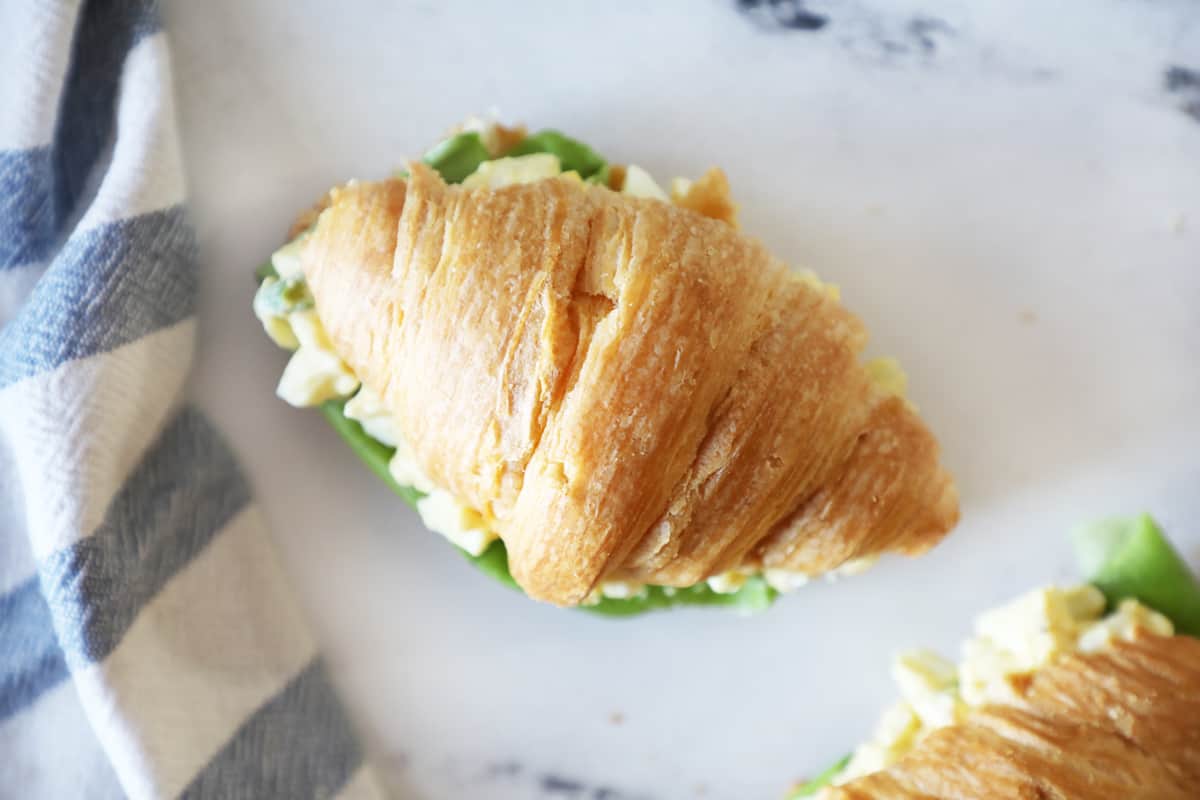 birds eye view of a croissant on a white plate