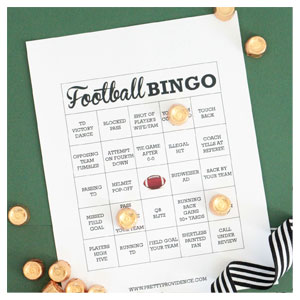 Football bingo on green background with gold rolo candy
