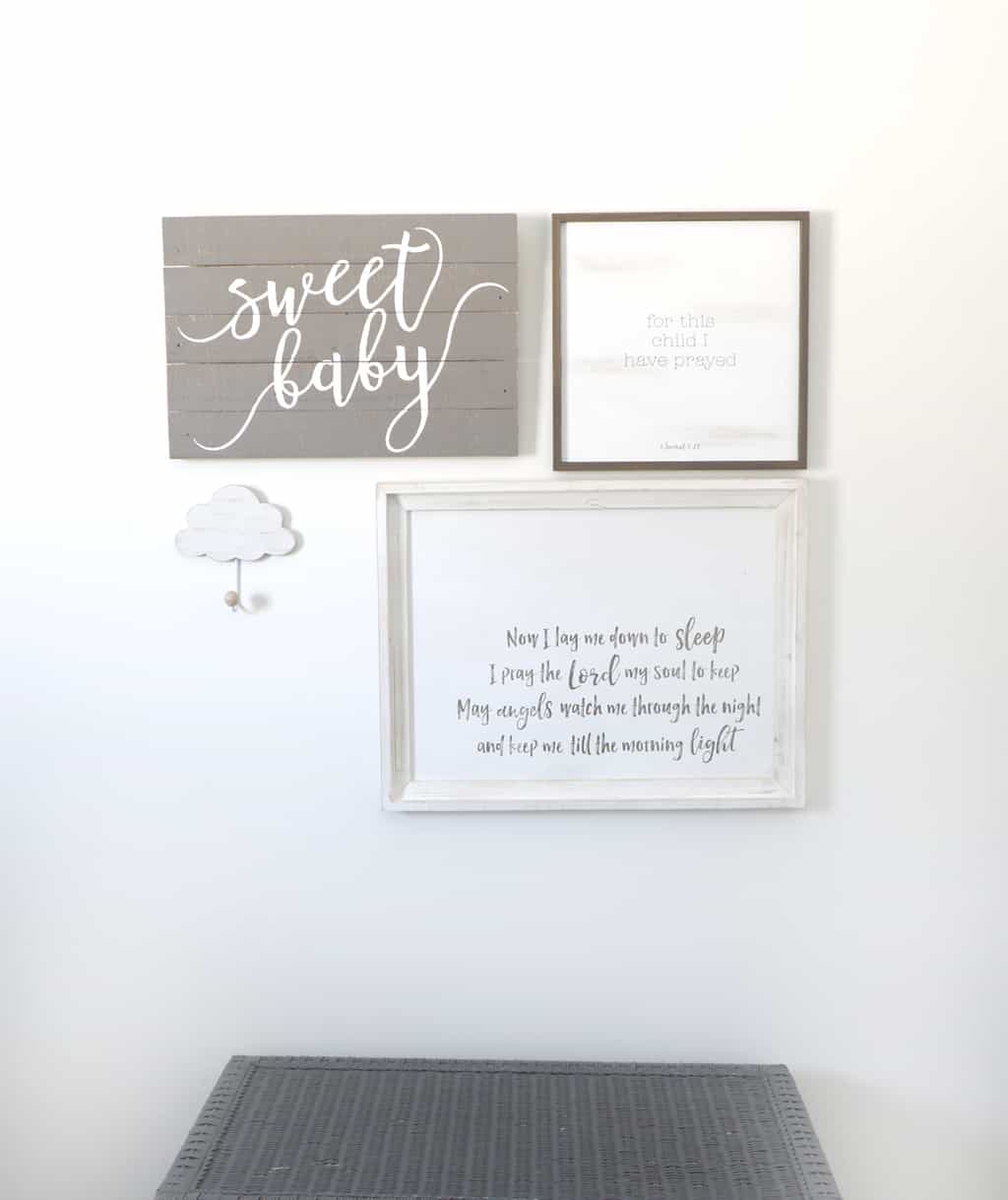 brown, grey and white gallery wall in nursery