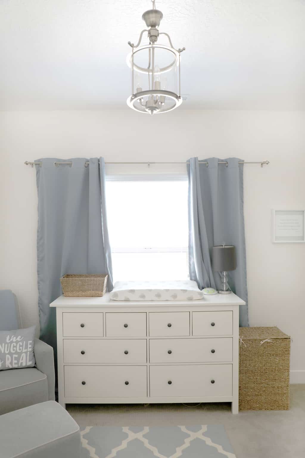 Pretty chrome lantern in a grey and blue nursery