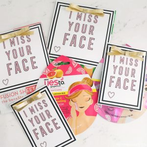 Face masks with 'I Miss Your Face' gift tags