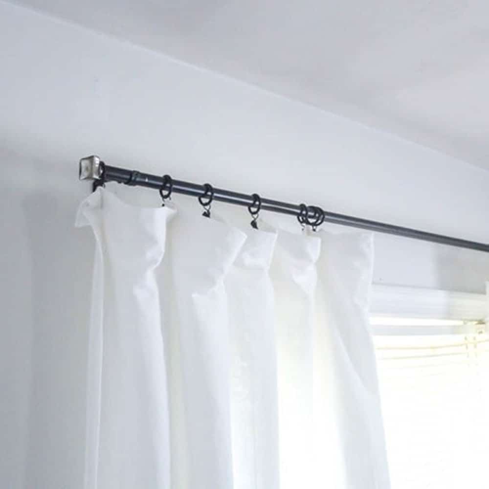 DIY Curtain Rod with finials and white curtains