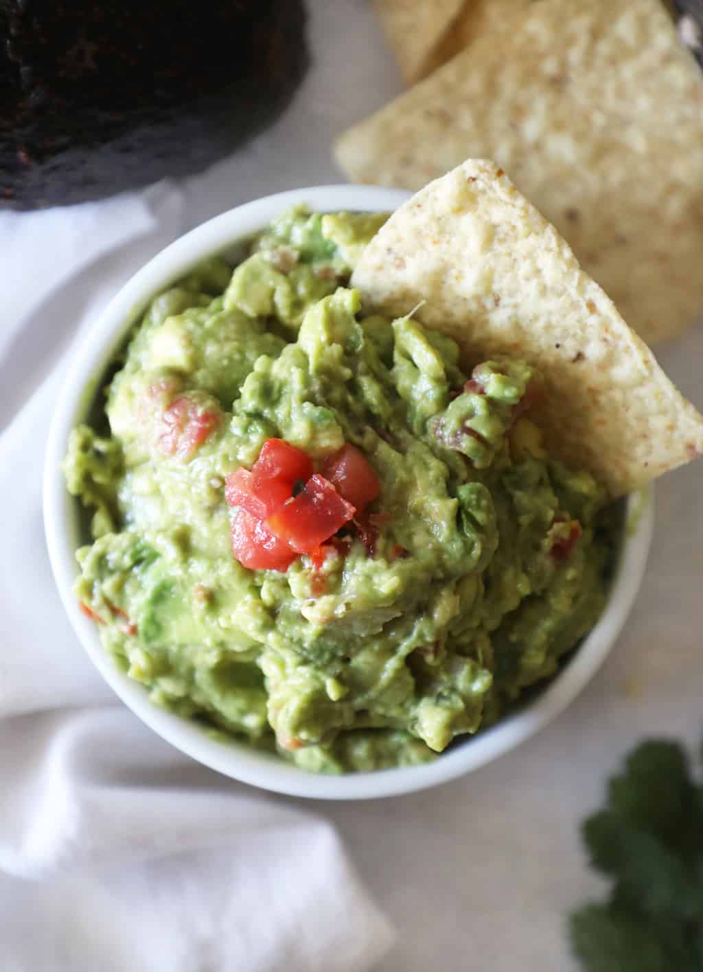 guacamole near a white tea towel