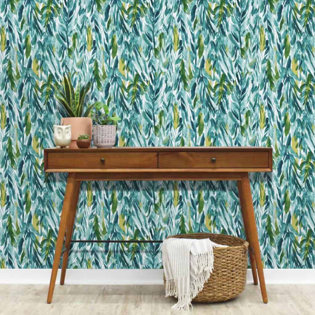 Leaves wallpaper with desk in front of it from Target