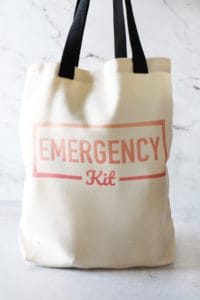 a full diy car emergency kit standing up against a white background
