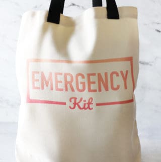 a full diy car emergency kit standing up against a white background