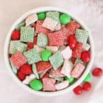 Red, green, pink and white muddy buddies with m&ms in it AKA reindeer chow