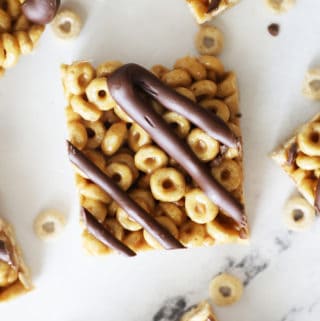 a cheerio bar with chocolate drizzled on top
