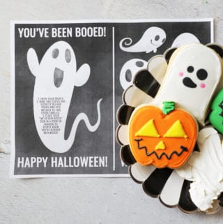 you've been booed printable with a black and white plate of treats on top of it