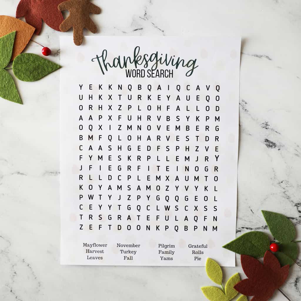 a Thanksgiving word search on a quartz countertop with leaves on the corners