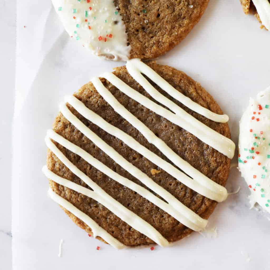 ginger snap cookie with white icing on it