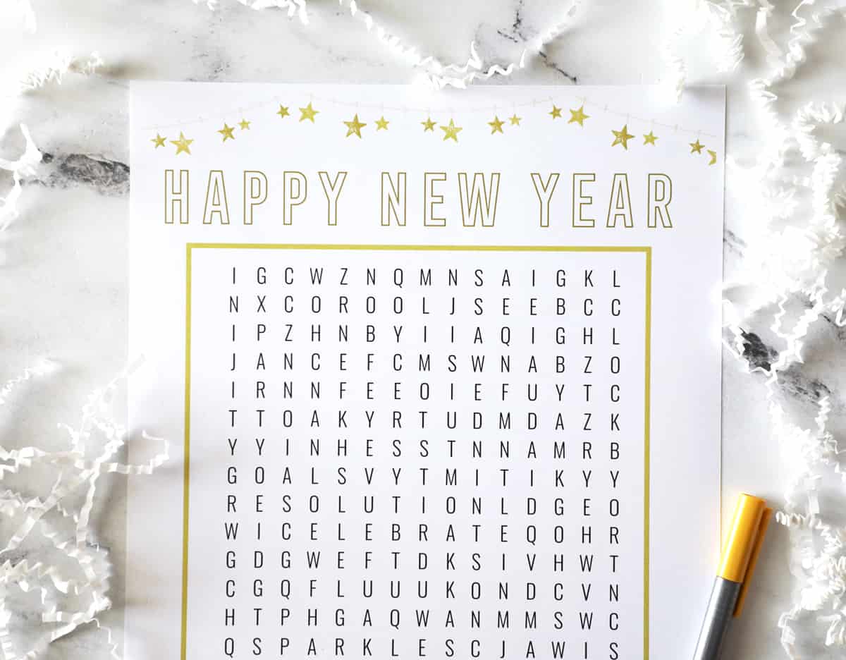 top half of a gold and white nye word search puzzle