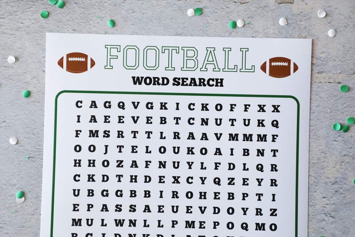 close up of a football word search on a cement table top