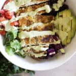 an image of a fish taco bowl with text overlay for pinterest