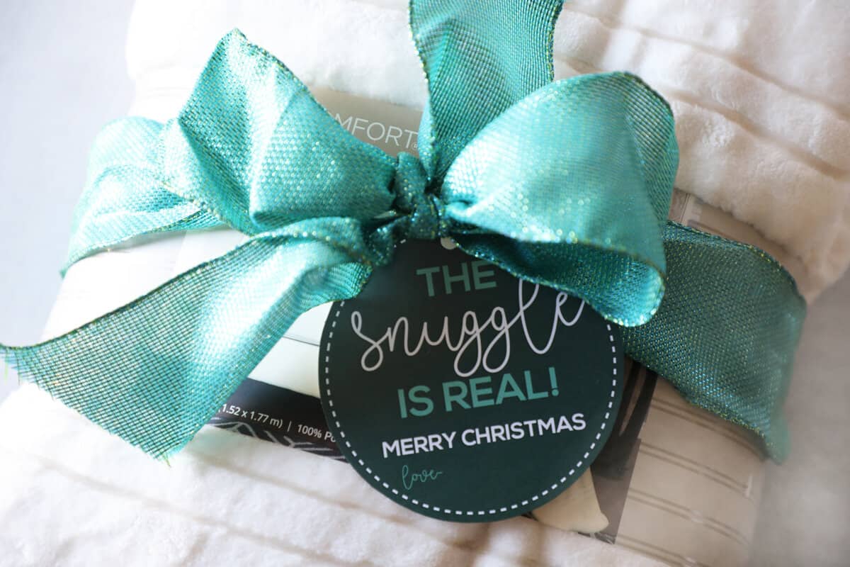 a free printable gift tag that says "the snuggle is real".
