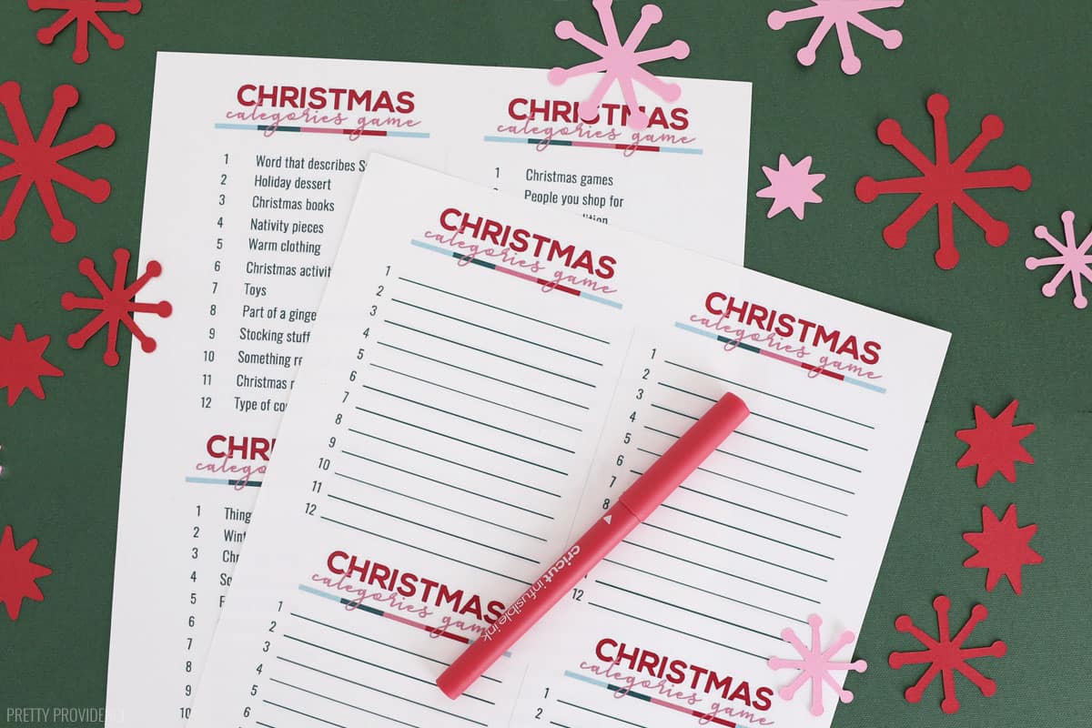 Christmas Scattergories game card with a red pen resting on top.