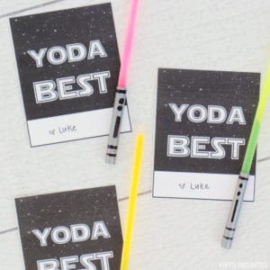 Star Wars Valentines that say "Yoda Best" with glow stick lightsabers.