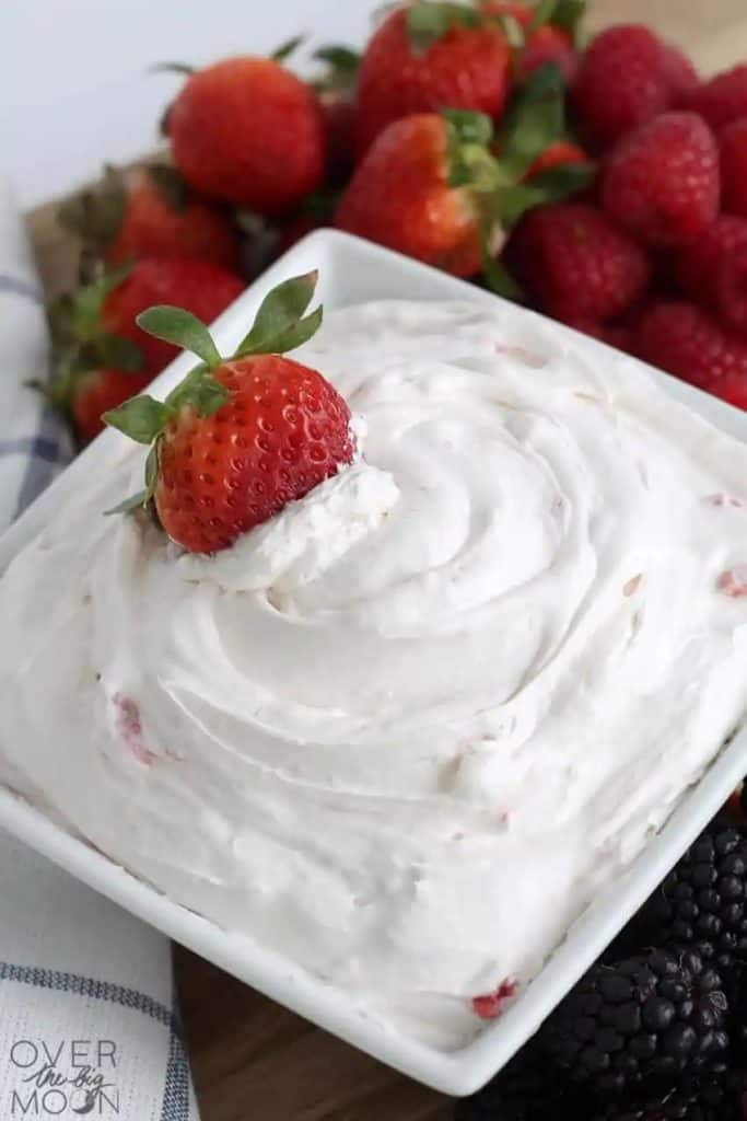 Cream cheese fruit dip with strawberries.