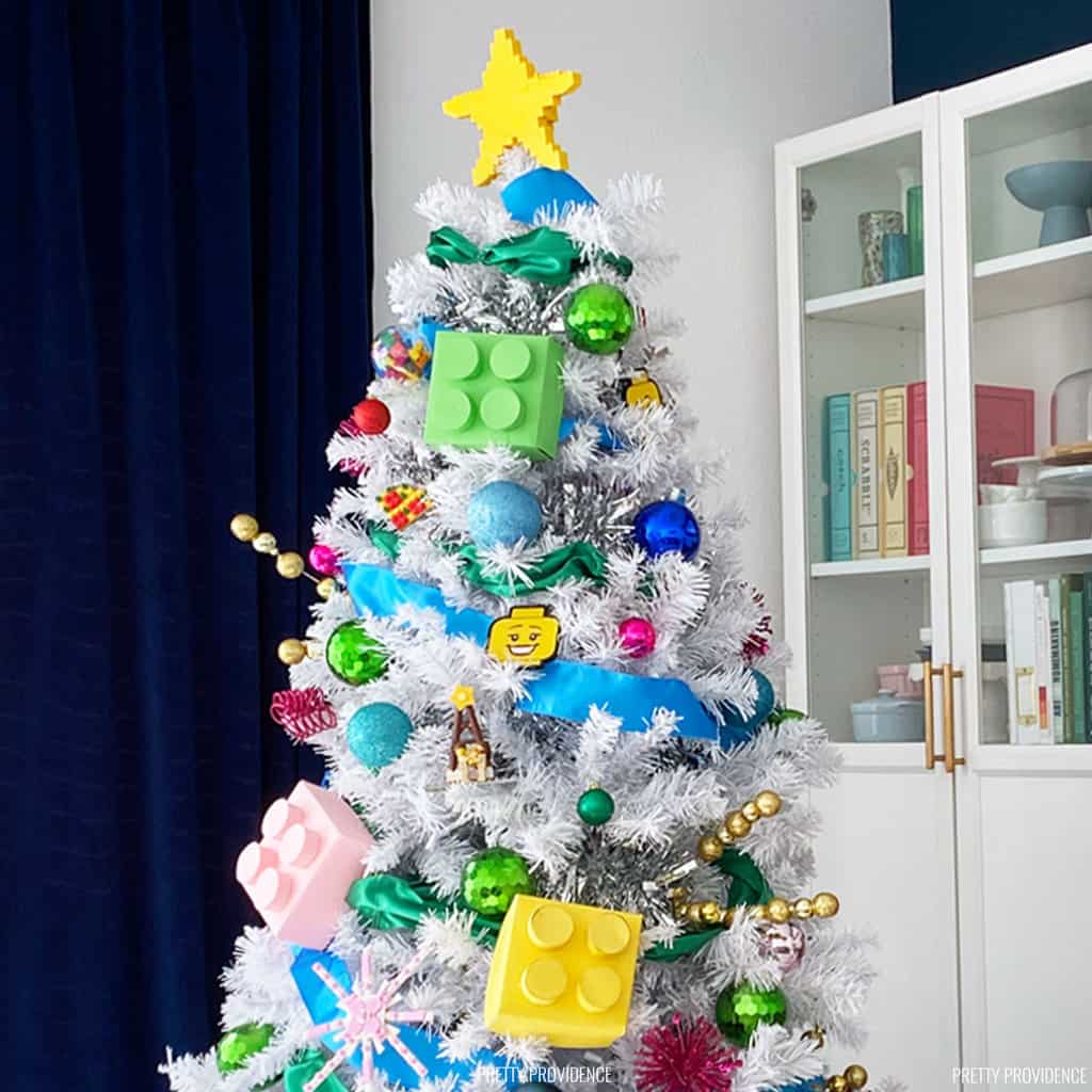 Lego Christmas tree, a white tree with large colorful lego ornaments and small ornaments made from lego bricks.