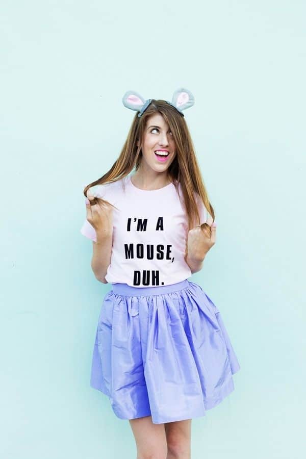A woman wearing mouse ears and a t-shirt that says Mean Girls inspired 'I'm a Mouse Duh" funny halloween costume for women.