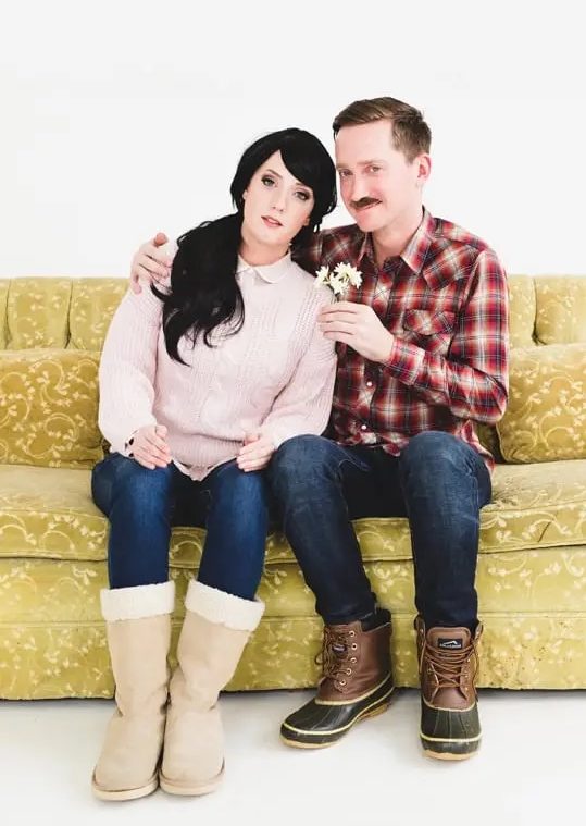 Couple on a yellow couch dressed as Lars and the Real Girl