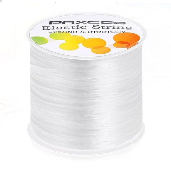 Clear elastic string on a spool.