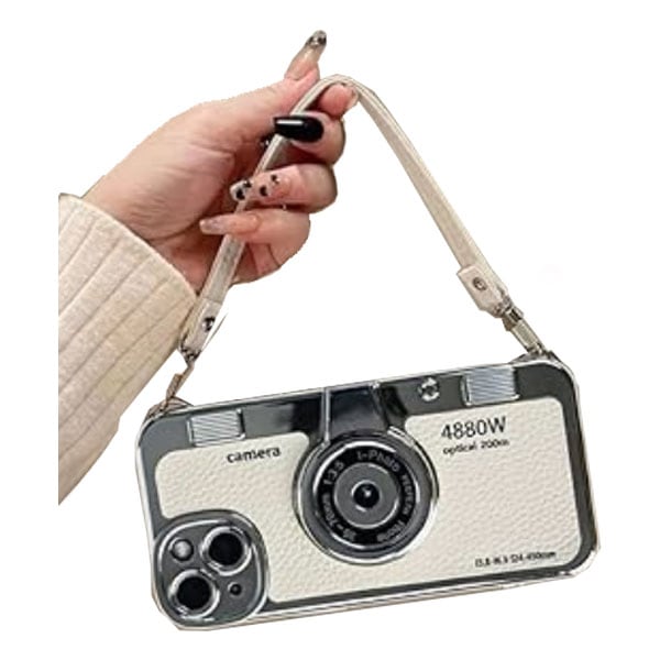 An iphone case that looks like a white vintage camera with a strap being held by a woman's hand.