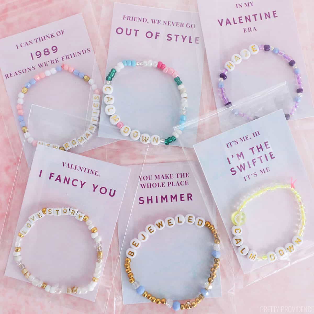 Taylor Swift friendship bracelets in small clear bags with Valentine's cards.