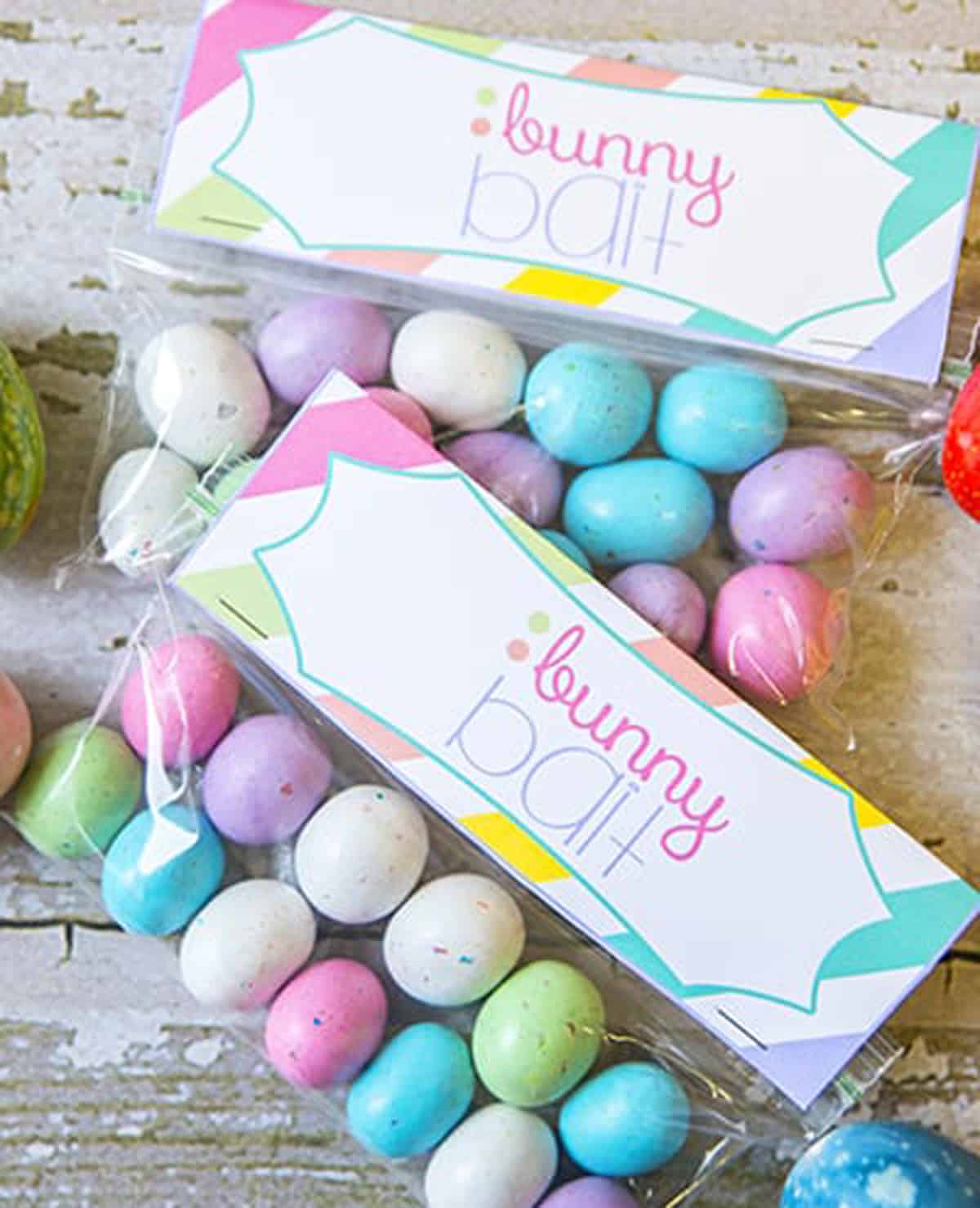 Two bags of Easter candy with "bunny bait" gift tags attached. 