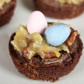 An Easter brownie bite with coconut frosting and then Cadbury eggs on top.