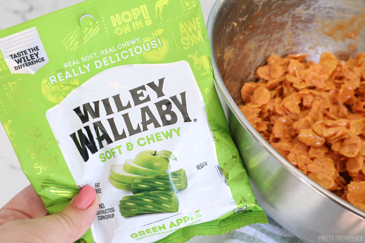 a close-up shot of a bag of wiley wallaby green licorice candy.