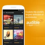 Audible logo and iphone screen with audiobook covers on it.