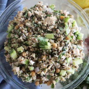 A bird's eye view of a clear glass bowl full of Jennifer Aniston salad.