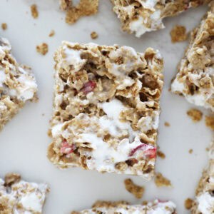 A bird's eye view of a Special K cereal bar with marshmallows and strawberries.