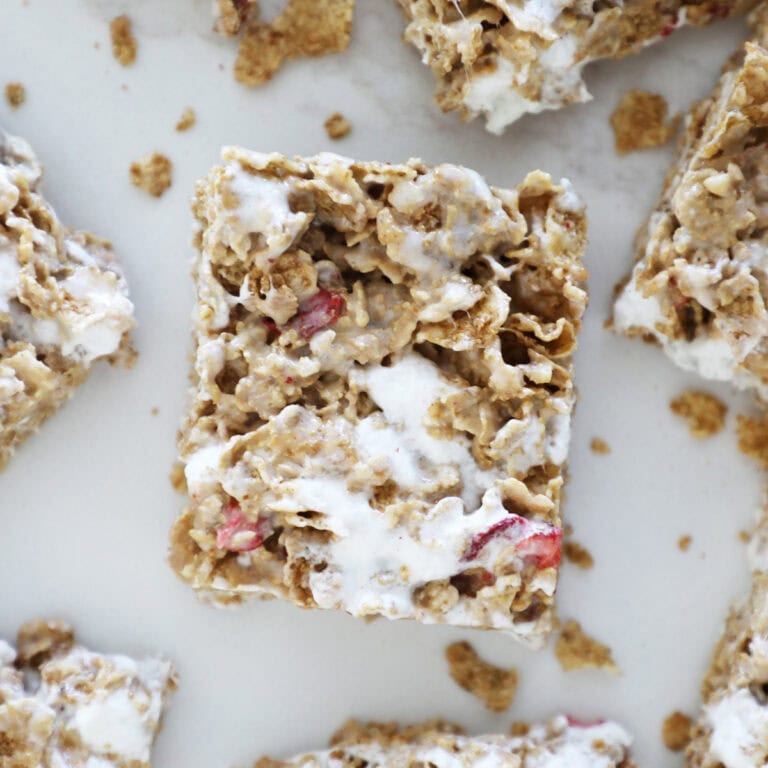A bird's eye view of a Special K cereal bar with marshmallows and strawberries.